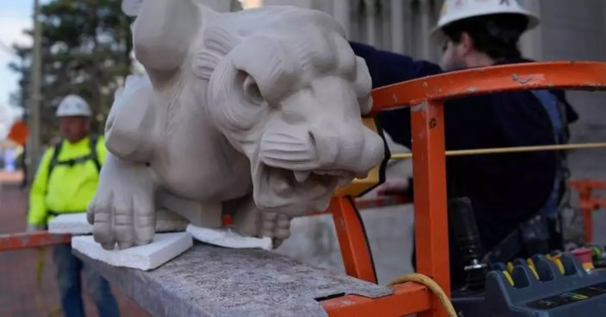 Final gargoyle returned to its perch atop rehabbed Kentucky cathedral modeled after Notre Dame