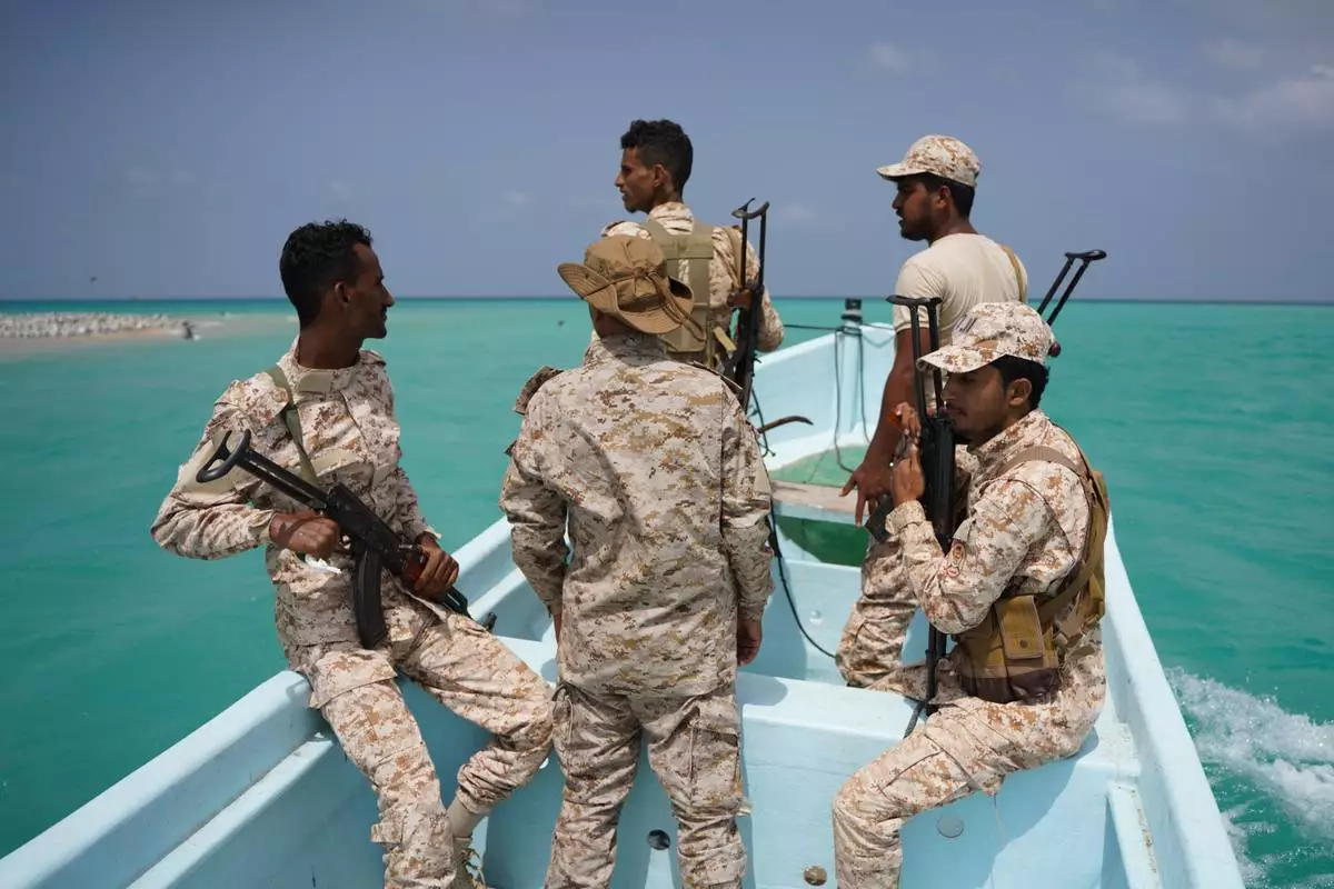FILE - Yemeni soldiers patrol the strategic Bab el-Mandeb Strait, Yemen, Sunday, April 5, 2026. (AP Photo/Abdulnasser Alseddik, File)