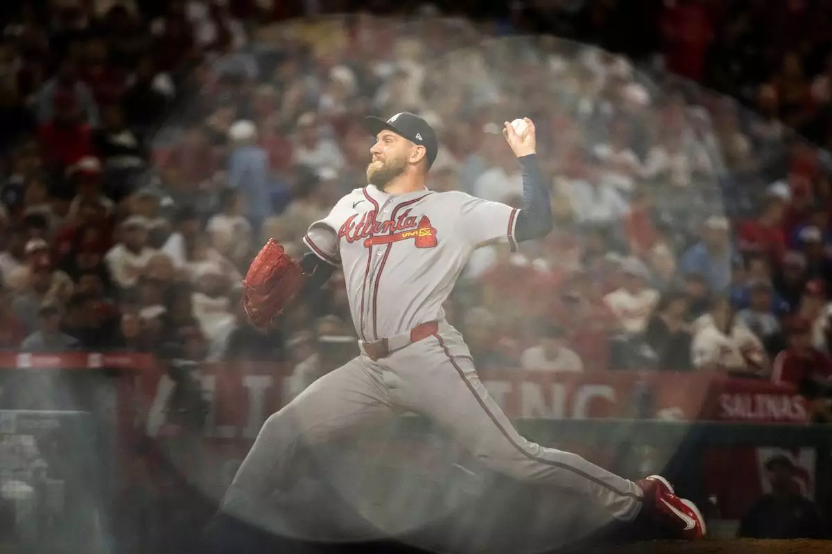 FILE - Atlanta Braves pitcher Dylan Lee delivers during the sixth inning of a baseball game against the Los Angeles Angels, Tuesday, April 7, 2026, in Anaheim, Calif. (AP Photo/Ethan Swope, File)