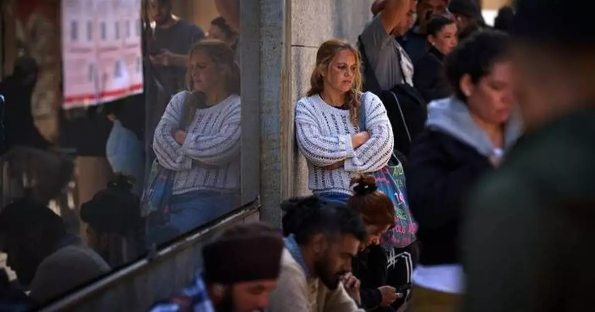 Migrants rush to apply under Spain’s new mass legalization program