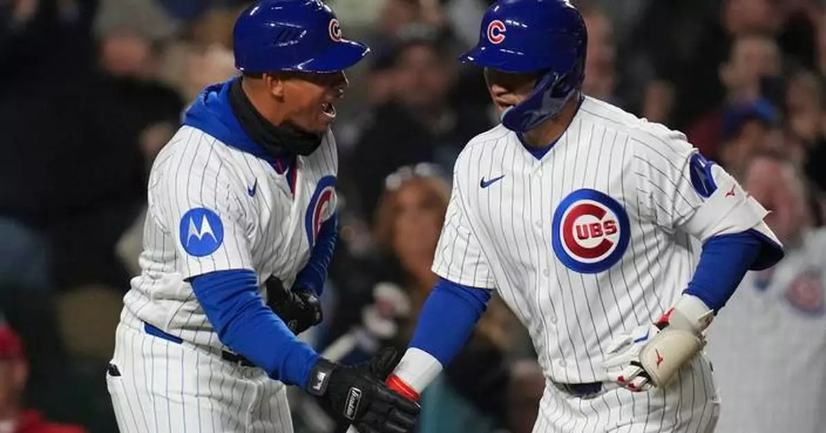 Busch and Suzuki homer as the Cubs beat the sliding Phillies 7-2 for their 8th straight win