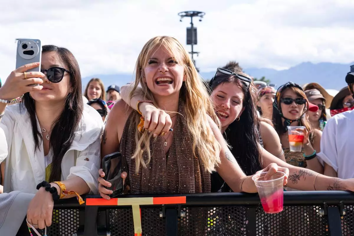 Festivalgoers are seen during the first weekend of Coachella Valley Music and Arts Festival on Sunday, April 12, 2026, in Indio, Calif. (Photo by Amy Harris/Invision/AP)