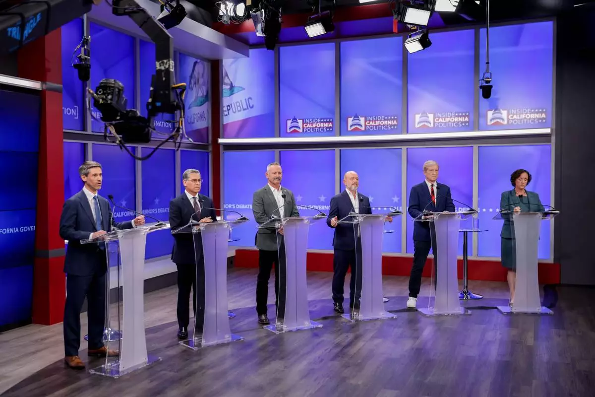 Candidates in California's gubernatorial race look on during a debate Wednesday, April 22, 2026, in San Francisco. (Jason Henry/Pool Photo via AP)