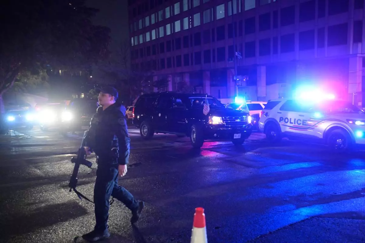 Law enforcement are seen outside the White House Correspondents Dinner, Saturday, April 25, 2026, in Washington. (AP Photo/Rod Lamkey, Jr.)