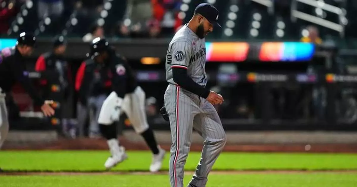 Mets fans mostly stay home but fill Citi Field with late boos as New York's skid hits 12 games