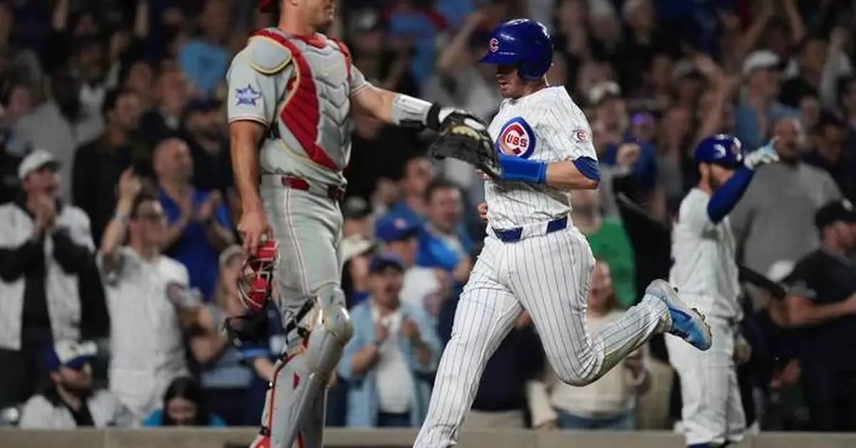 Struggling Phillies place catcher J.T. Realmuto on the 10-day IL with back spasms