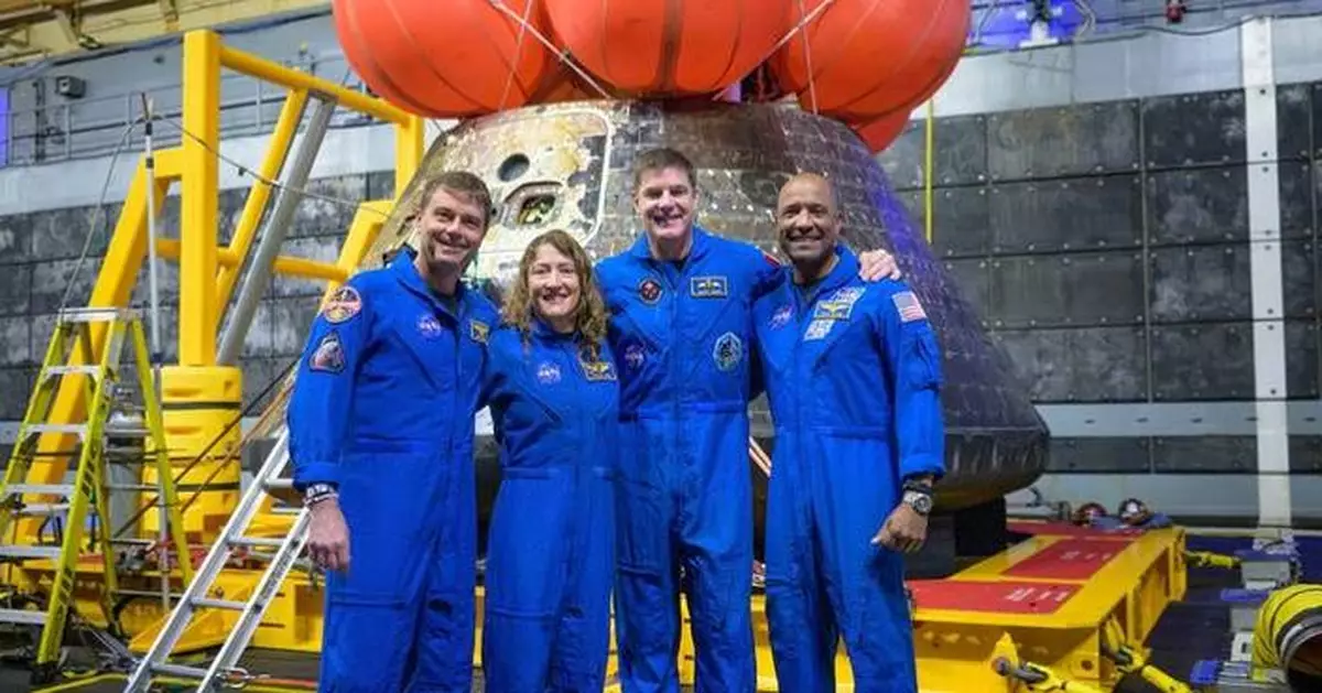 Artemis II's moon-traveling astronauts return home to cheers after a record-breaking trip