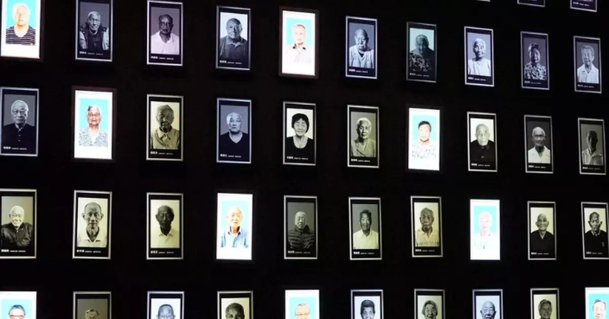 HK Media’s Jiangsu Tour: Fading Memories - Survivors' Portraits Turn Black and White at Nanjing Massacre Hall