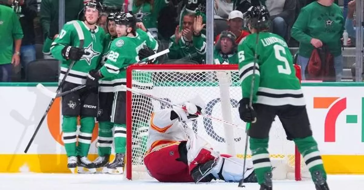 Johnston scores in OT in Stars comeback win over the Flames 4-3