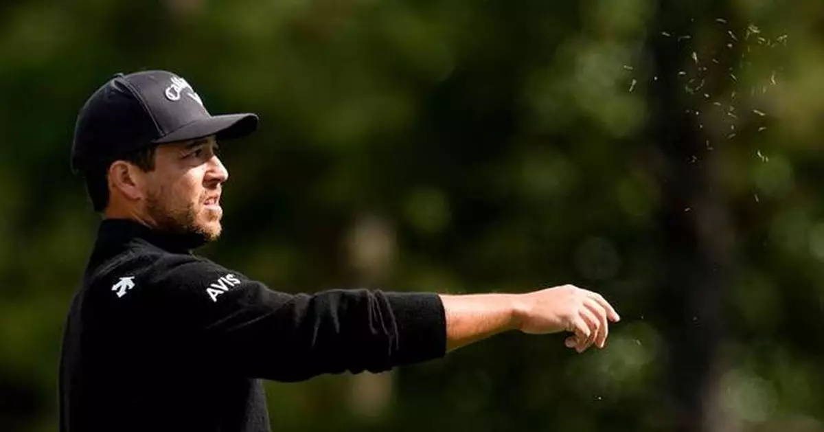 Schauffele's drive appears to land in a viewer's merchandise bag. It didn't stop him from making par