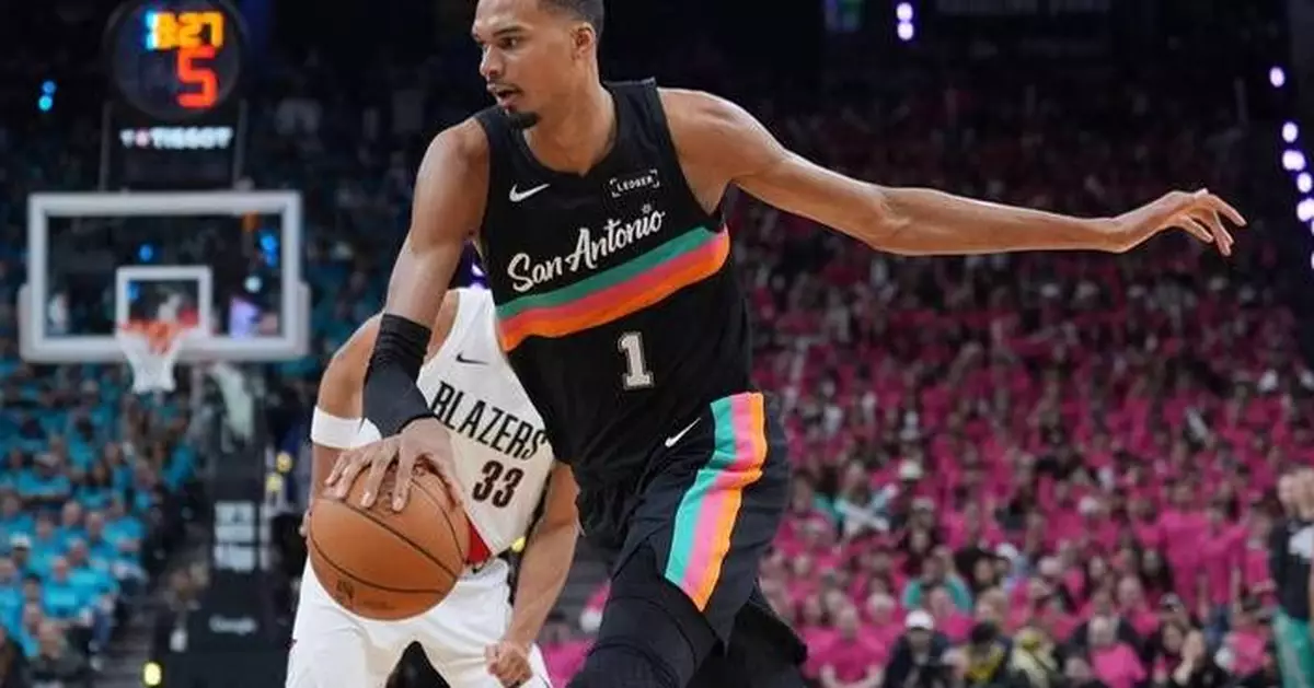 Wembanyama revels in safety of Hall of Famers, fans in playoff debut as Spurs top Blazers