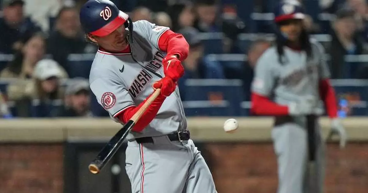 Brady House hits a grand slam and the Nationals blow out the staggering Mets 14-2 in the rain