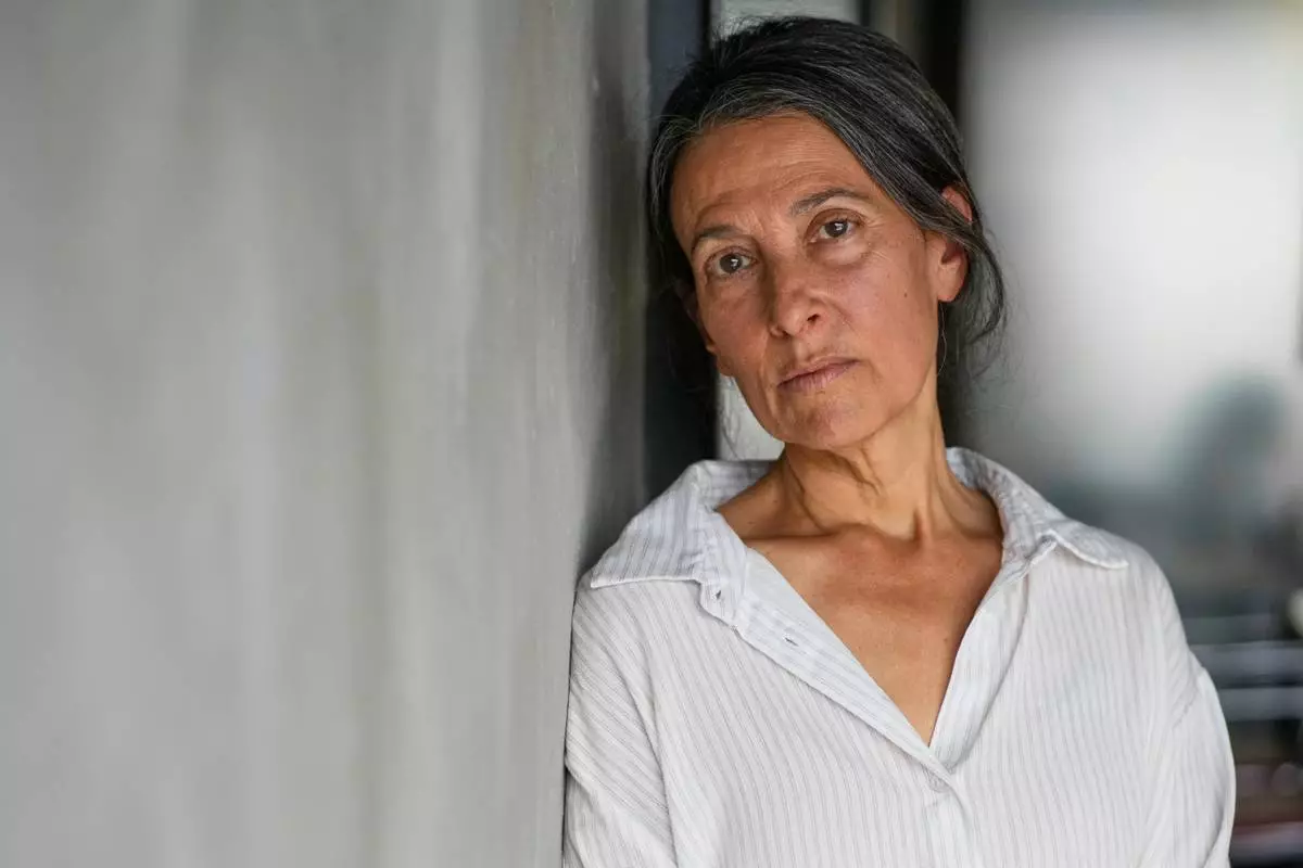 Rachel Goldberg-Polin, whose 23-year-old son, Hersh, was kidnapped on Oct. 7, 2023 Hamas cross border attack on Israel and killed in Gaza nearly a year later, poses for a photo in Jerusalem, Wednesday, April 15, 2026. (AP Photo/Ohad Zwigenberg)