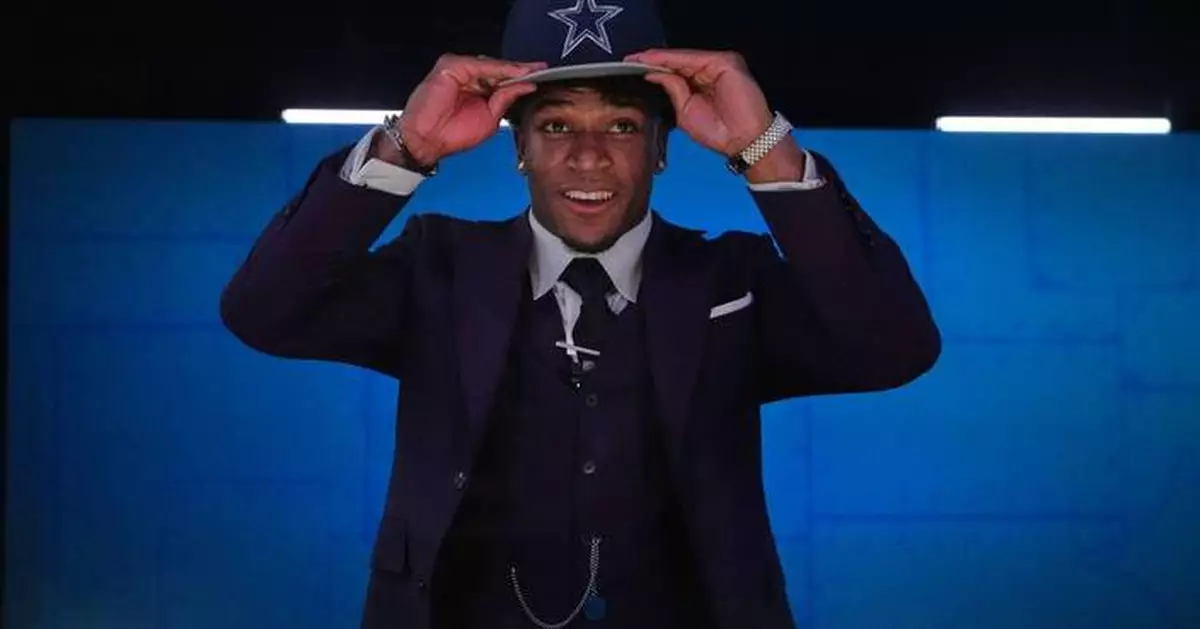 Cowboys get Ohio State's Downs and UCF's Lawrence in NFL draft after moving twice in 1st round