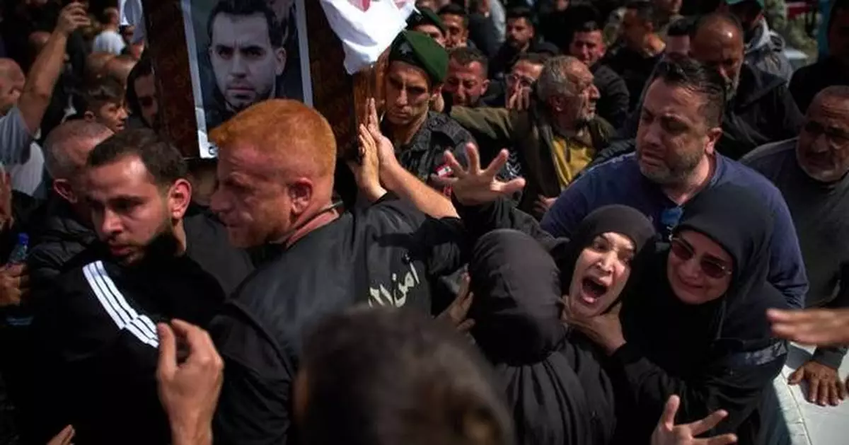 Lebanese bury 13 officers killed by Israel as grief and outrage surge ahead of talks in the US