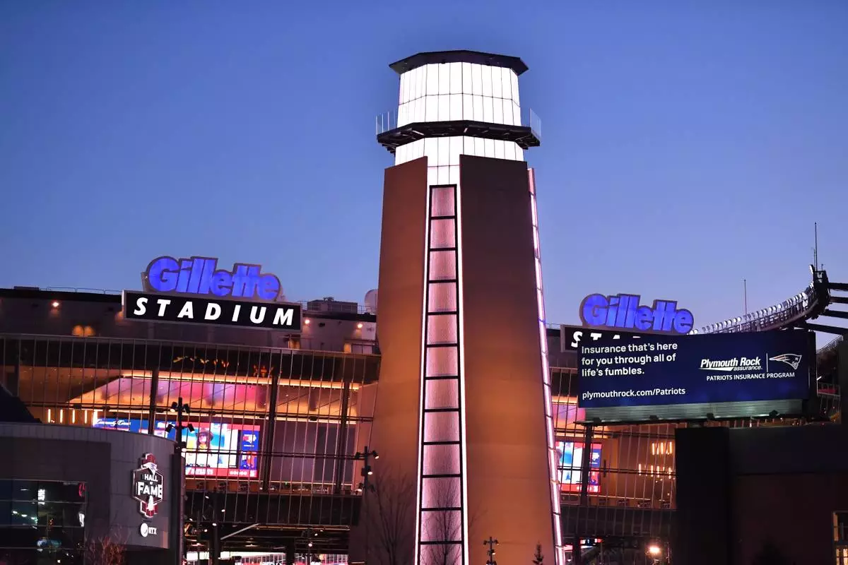 FILE - Gillette Stadium appears illuminated, Dec. 1, 2025, before an NFL football game in Foxborough, Mass. (AP Photo/Steven Senne, File)