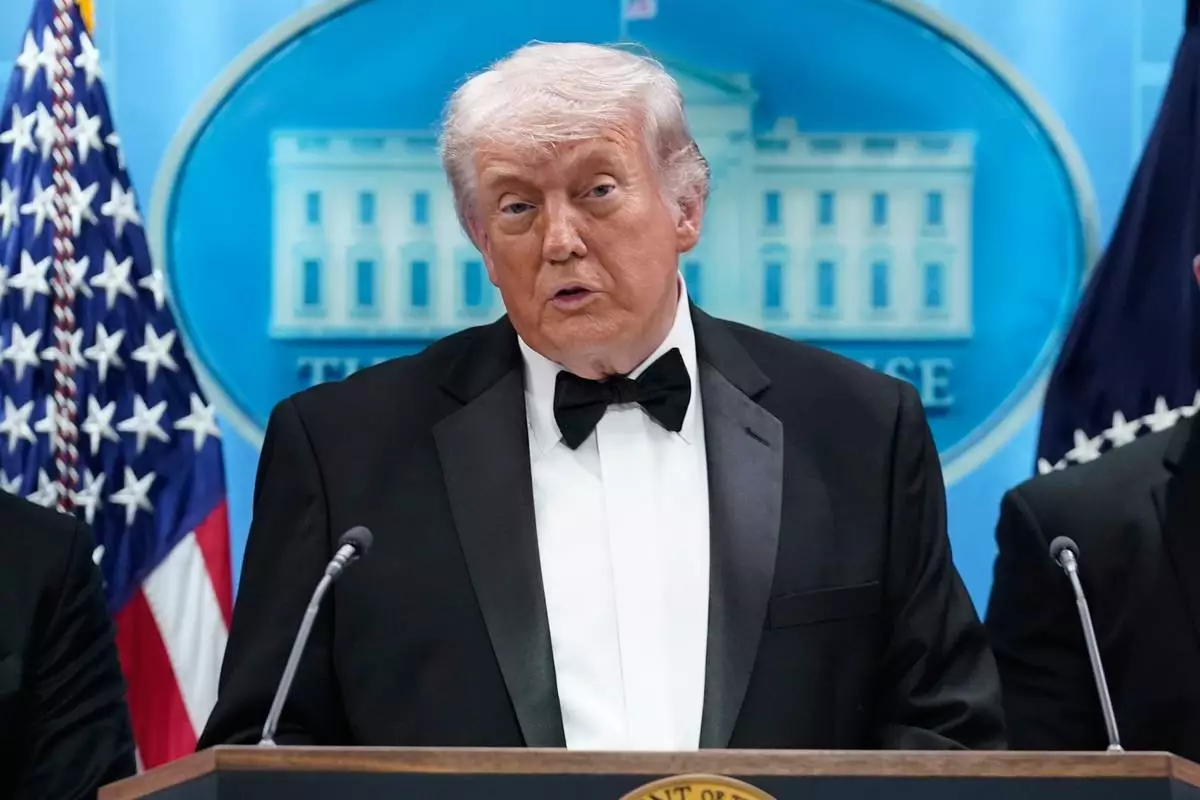 President Donald Trump speaks in the James Brady Press Briefing Room at the White House after an unspecified threat at the annual White House Correspondents' Association Dinner in Washington, Saturday, April 25, 2026. (AP Photo/Jose Luis Magana)