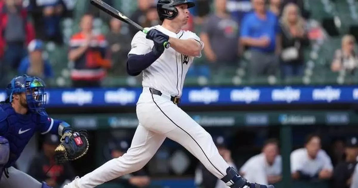 Tigers extend win streak to 6 by rallying in 9th for rain-delayed 10-9 victory over Royals