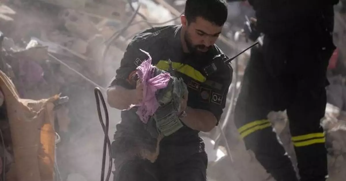 Lebanon digs for survivors after Israeli attack kills over 300, as surprise word of talks emerges