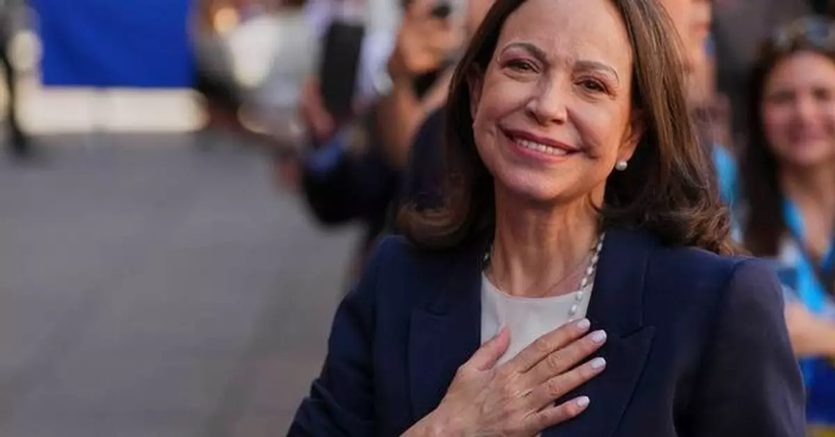 Venezuela’s Maria Corina Machado draws a huge Madrid crowd and rebuffs meeting with Spain's PM