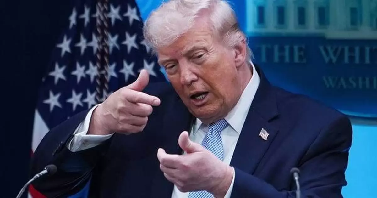 Photos of Trump's Monday, talking Iran at Easter Egg Roll and mimicking a sniper in the press room