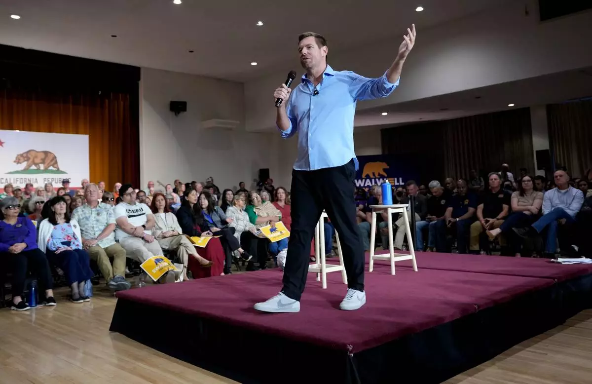 California gubernatorial candidate Rep. Eric Swalwell, D-Calif., speaks at a town hall meeting in Sacramento, Calif., Tuesday, April 7, 2026. (AP Photo/Rich Pedroncelli)