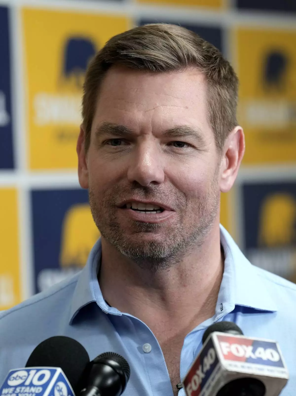California gubernatorial candidate Rep. Eric Swalwell, D-Calif., talks with reporters after holding a town hall meeting in Sacramento, Calif., Tuesday, April 7, 2026. (AP Photo/Rich Pedroncelli)