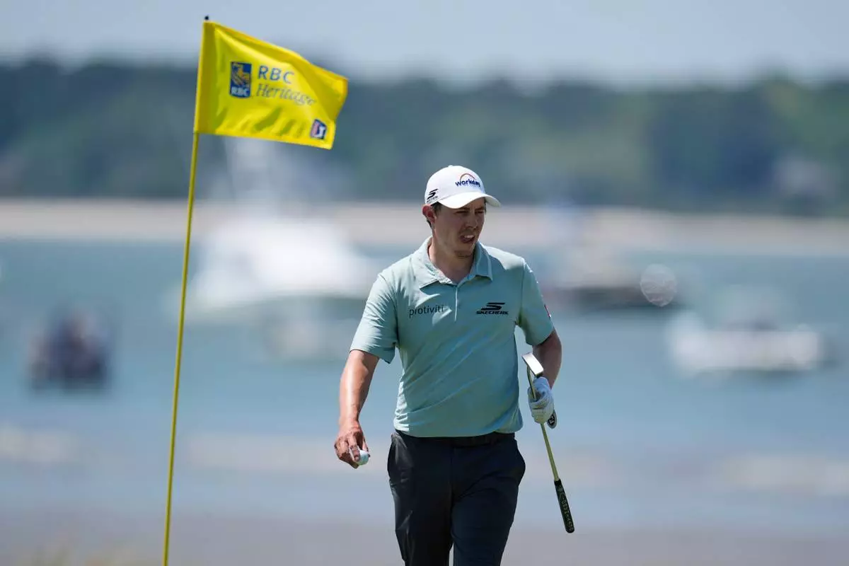 Matt Fitzpatrick, of England, prepares to putt on the 18th hole during the second round at the RBC Heritage golf tournament Friday, April 17, 2026, in Hilton Head, S.C. (AP Photo/Mike Stewart)