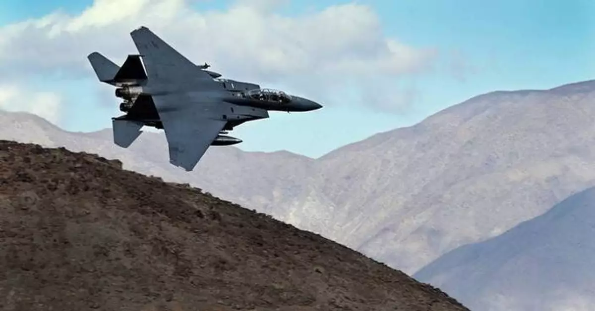 The Latest: 2 US aircraft go down and 1 crew member missing as war in Iran takes a dramatic turn