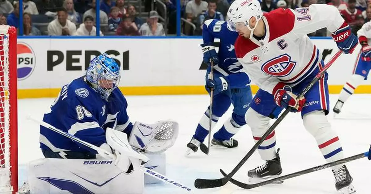 Moser scores in OT as Lightning beat Canadiens 3-2 in Game 2 and tie first-round series