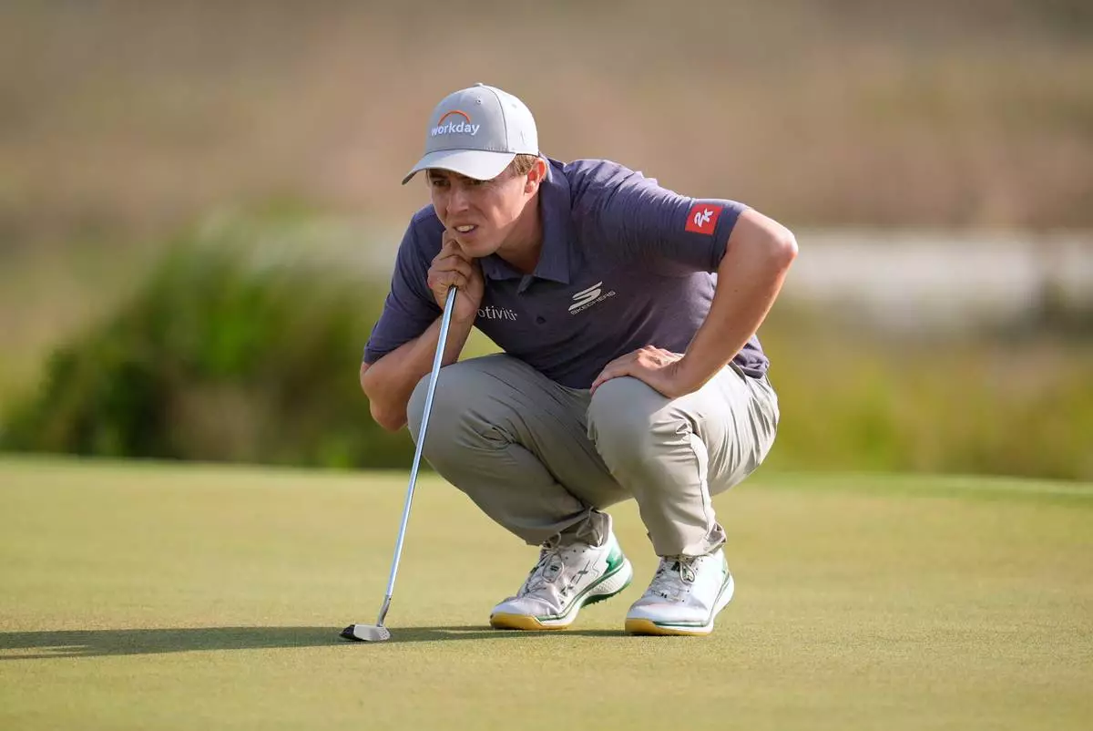Matt Fitzpatrick, of England, prepares to putt on the 18th hole during the third round of the RBC Heritage golf tournament Saturday, April 18, 2026, in Hilton Head, S.C. (AP Photo/Mike Stewart)