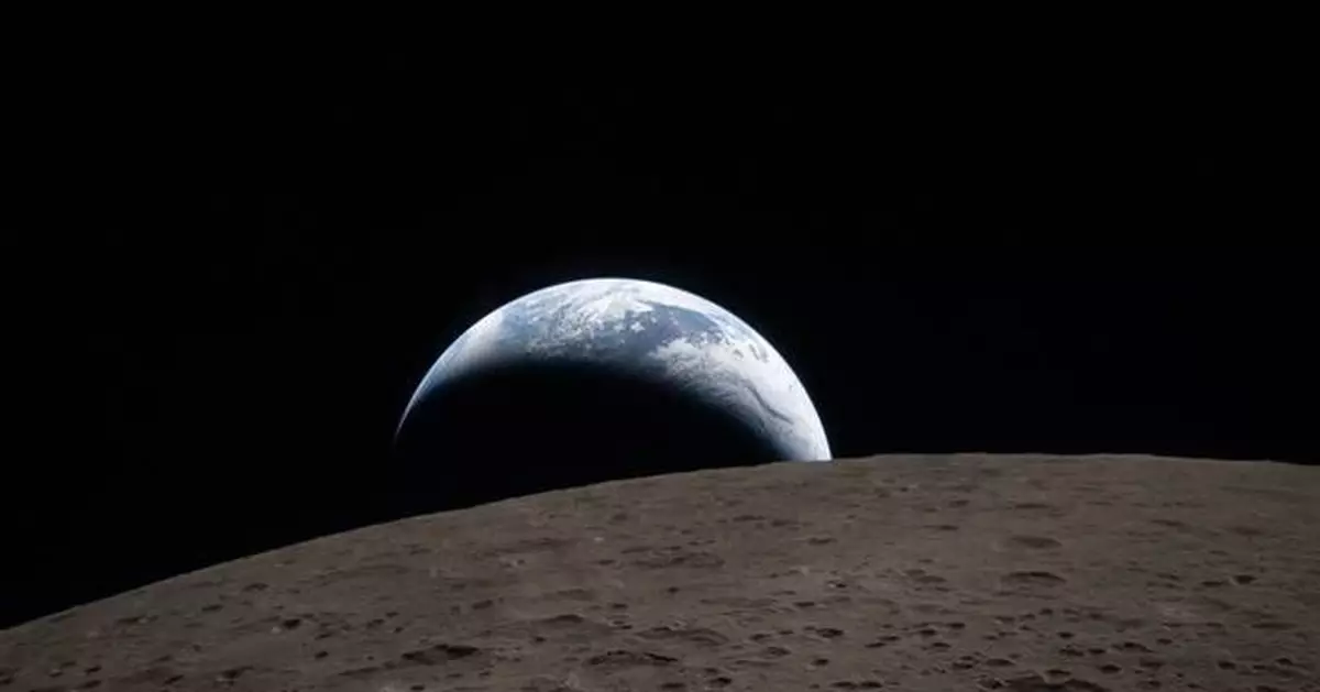 Artemis II astronauts channel Apollo 8 with a striking Earthset photo