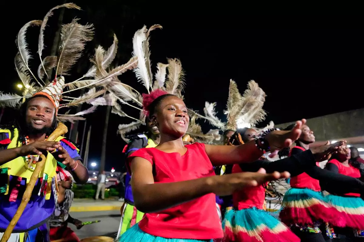 Traditional dancers perform to welcome Sabastian Sawe after he arrived on a plane from London, Wednesday, April 29, 2026, at Jomo Kenyatta International Airport in Nairobi, Kenya, after breaking the marathon world record (AP Photo/Brian Inganga) CORRECTION: Corrects spelling of first name to Sabastian, not Sebastian