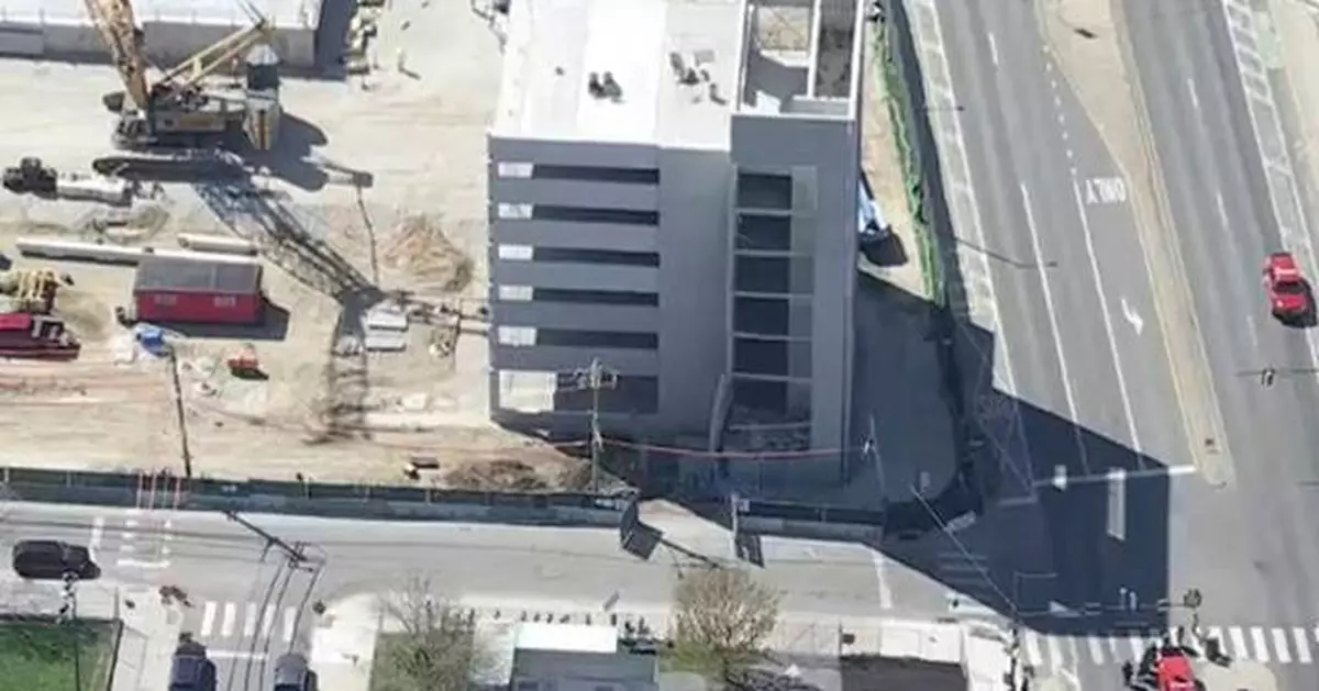 1 killed and 2 missing after partial roof collapse at parking garage being built in Philadelphia