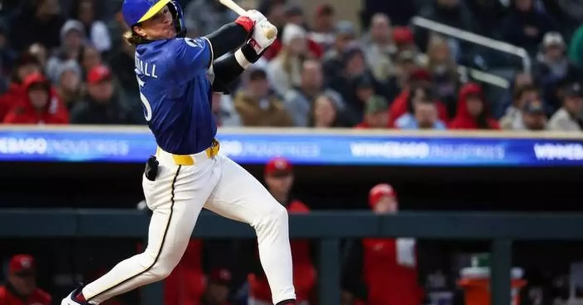 Suárez drives in 2 and Williamson pitches into the 6th as Reds beat Twins 2-1