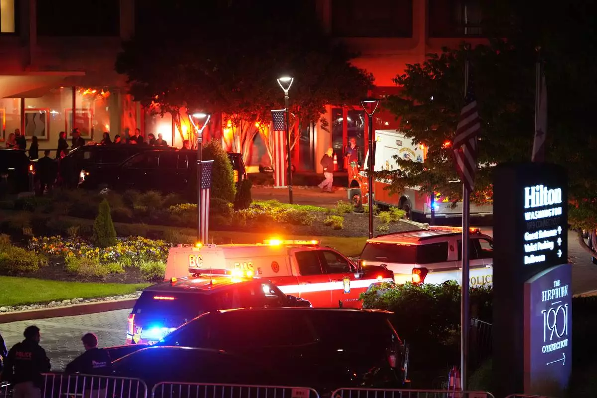 Law enforcement respond to an incident at the Washington Hilton during the White House Correspondents Dinner, Saturday, April 25, 2026, in Washington. (AP Photo/Allison Robbert)