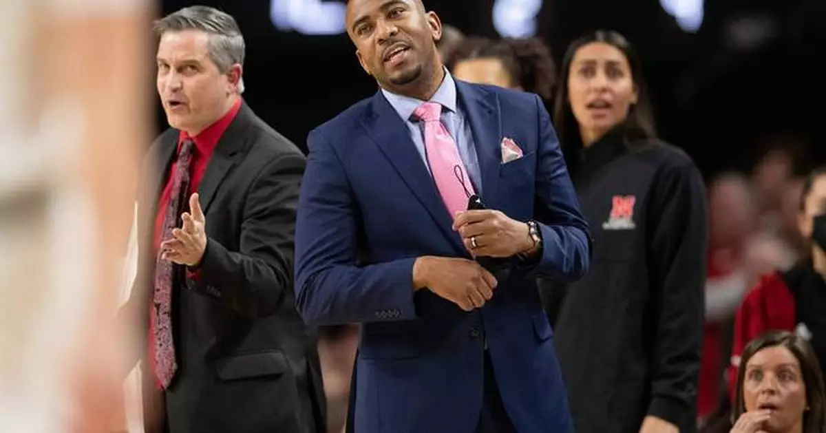 Attorney says in court papers that ex-Nebraska assistant Chuck Love admitted having sex with player