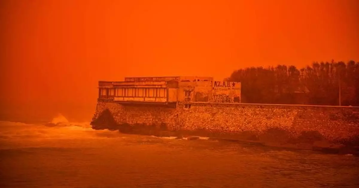 Saharan dust storm turns Greek sky red as winds and flooding leave 1 person dead