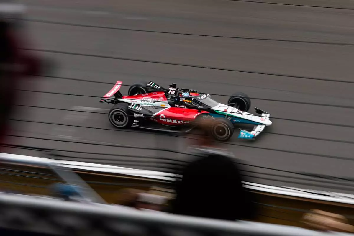 FILE - Takuma Sato, of Japan, speeds down the main straightaway during the Indianapolis 500 auto race at Indianapolis Motor Speedway in Indianapolis, May 25, 2025. (AP Photo/AJ Mast, File)