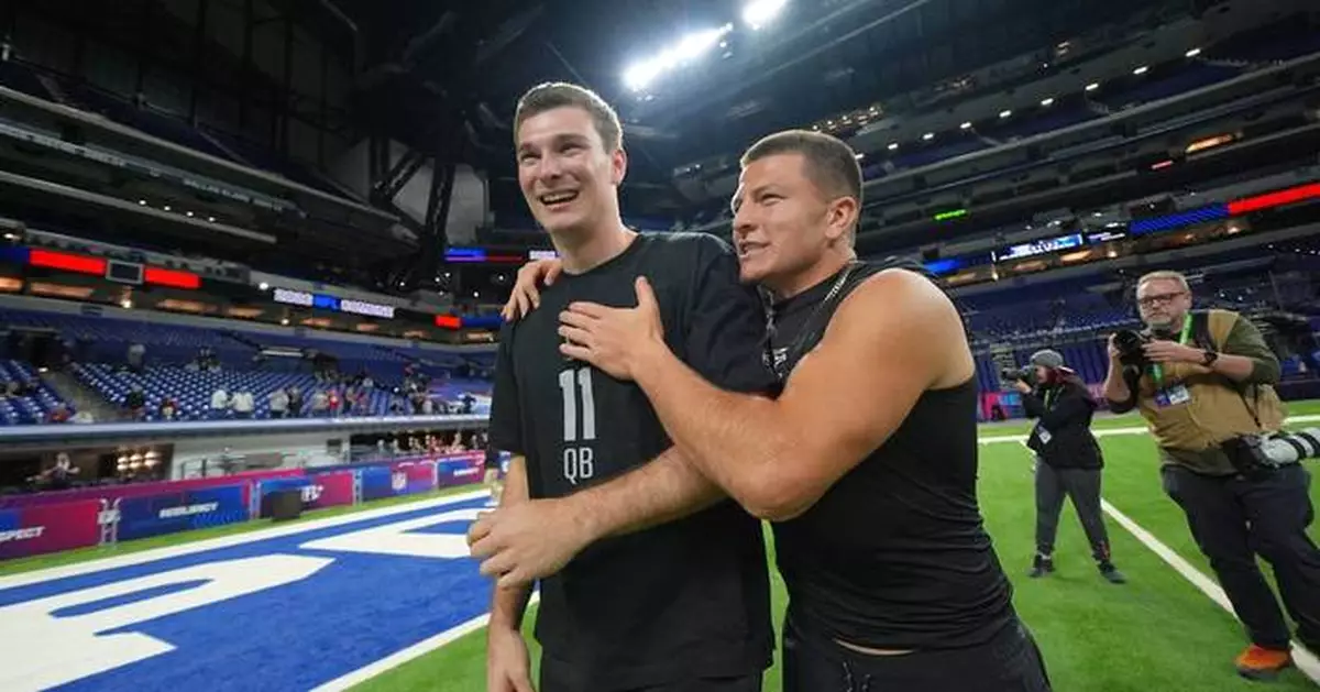 Heisman runner-up Pavia agrees to sign with the Ravens as an undrafted free agent, an AP source says