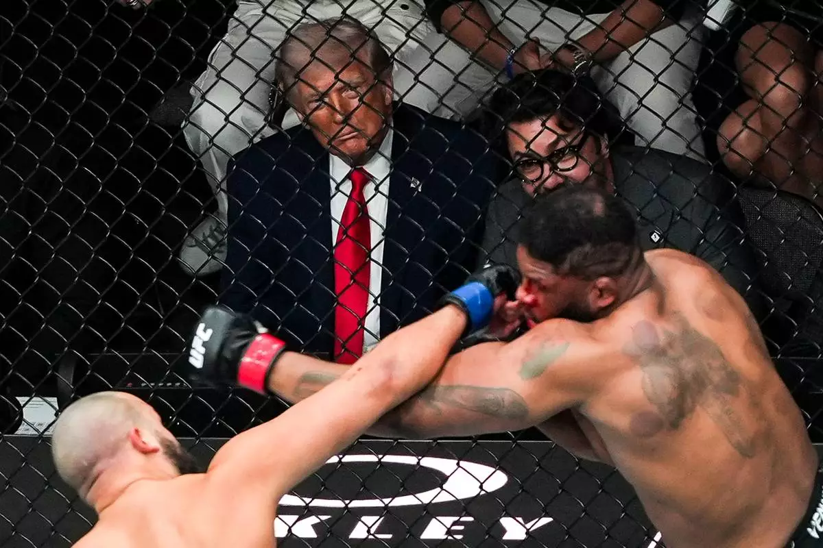 FILE - President Donald Trump and Hunter Campbell attend UFC 327 at Kaseya Center, Saturday, April 11, 2026, in Miami. (AP Photo/Julia Demaree Nikhinson, File)