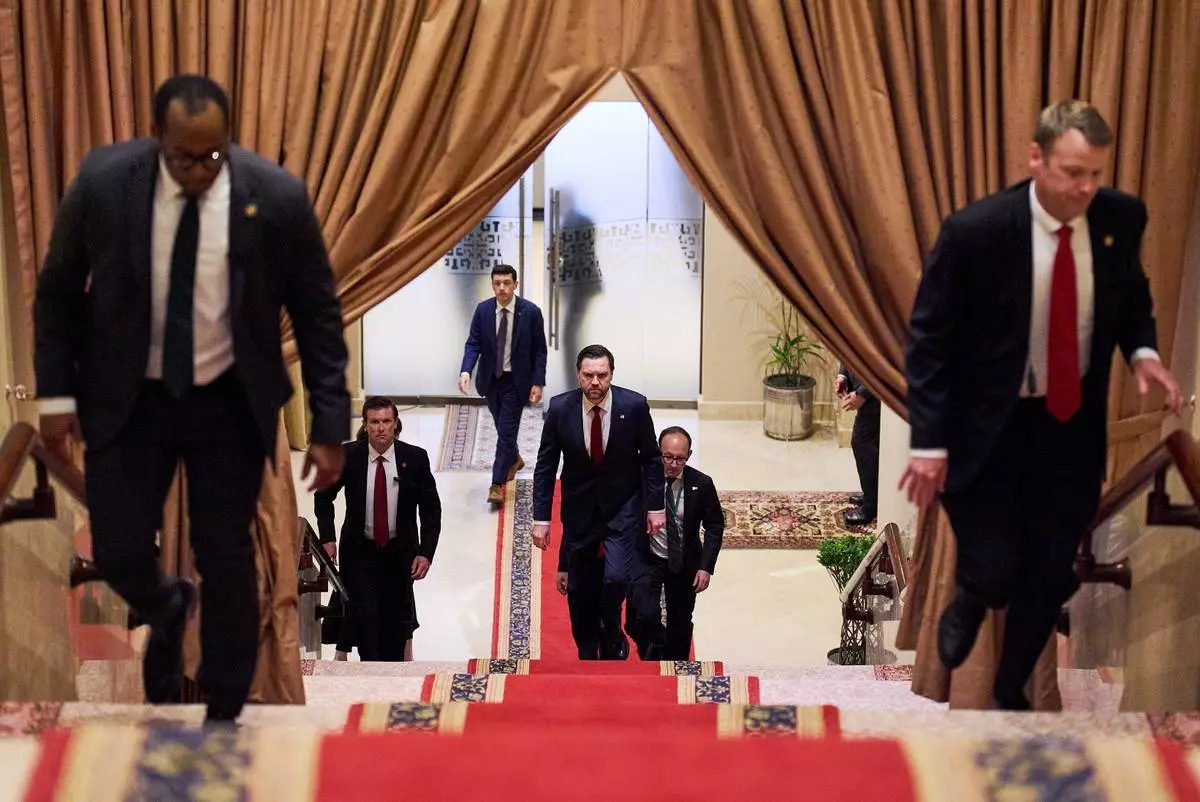 FILE - U.S. Vice President JD Vance, center, walks up a flight of stairs to meet with Pakistan's Prime Minister Shehbaz Sharif, Saturday, April 11, 2026, in Islamabad, for talks about Iran. (AP Photo/Jacquelyn Martin, pool, File)