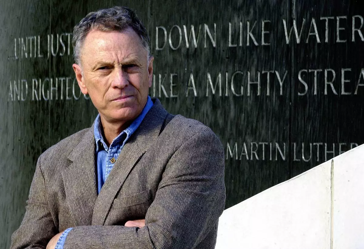 FILE - Southern Poverty Law Center Director Morris Dees attends a news conference Nov. 18, 2002, at the Civil Rights Memorial at the Southern Poverty Law Center in Montgomery, Ala. (AP Photo/Dave Martin, File)