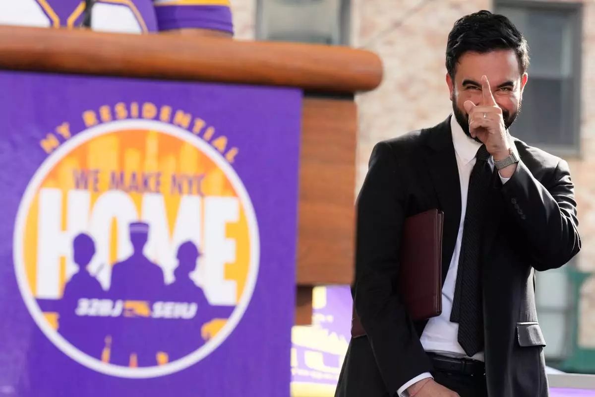 New York City mayor Zohran Mamdani reacts while he is introduced during a union rally on Park Avenue, in New York, Wednesday, April 15, 2026. (AP Photo/Seth Wenig)