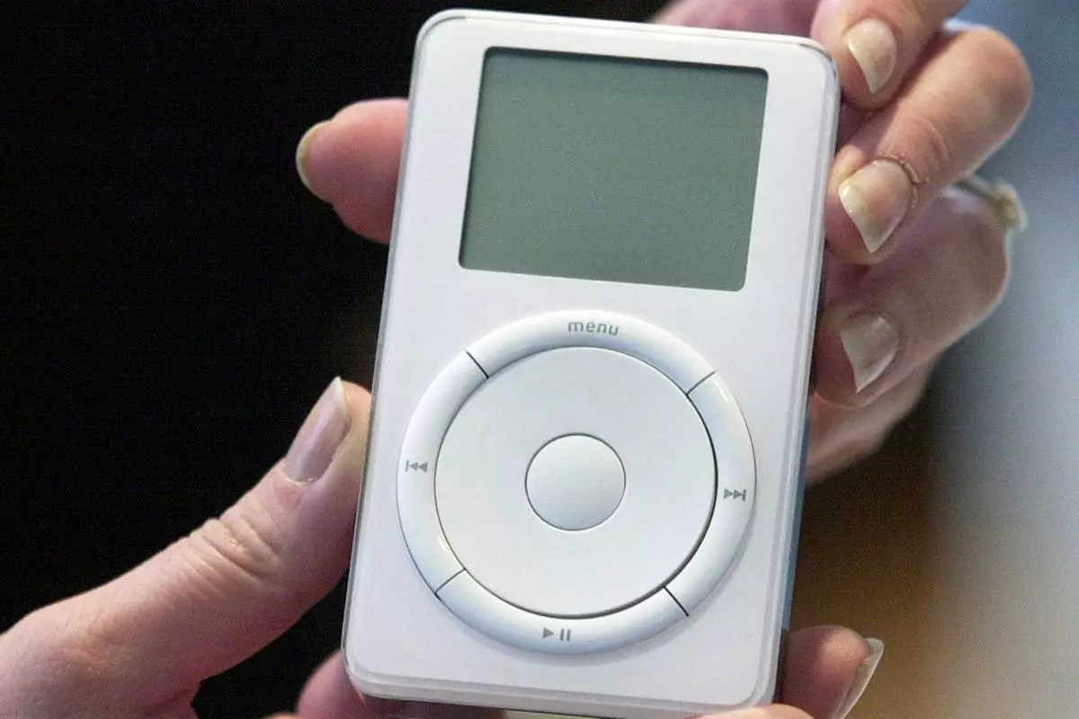 FILE - An iPod is displayed after its introduction by Apple CEO Steve Jobs during a news conference, Oct. 23, 2001, in Cupertino, Calif. (AP Photo/Julie Jacobson, File)