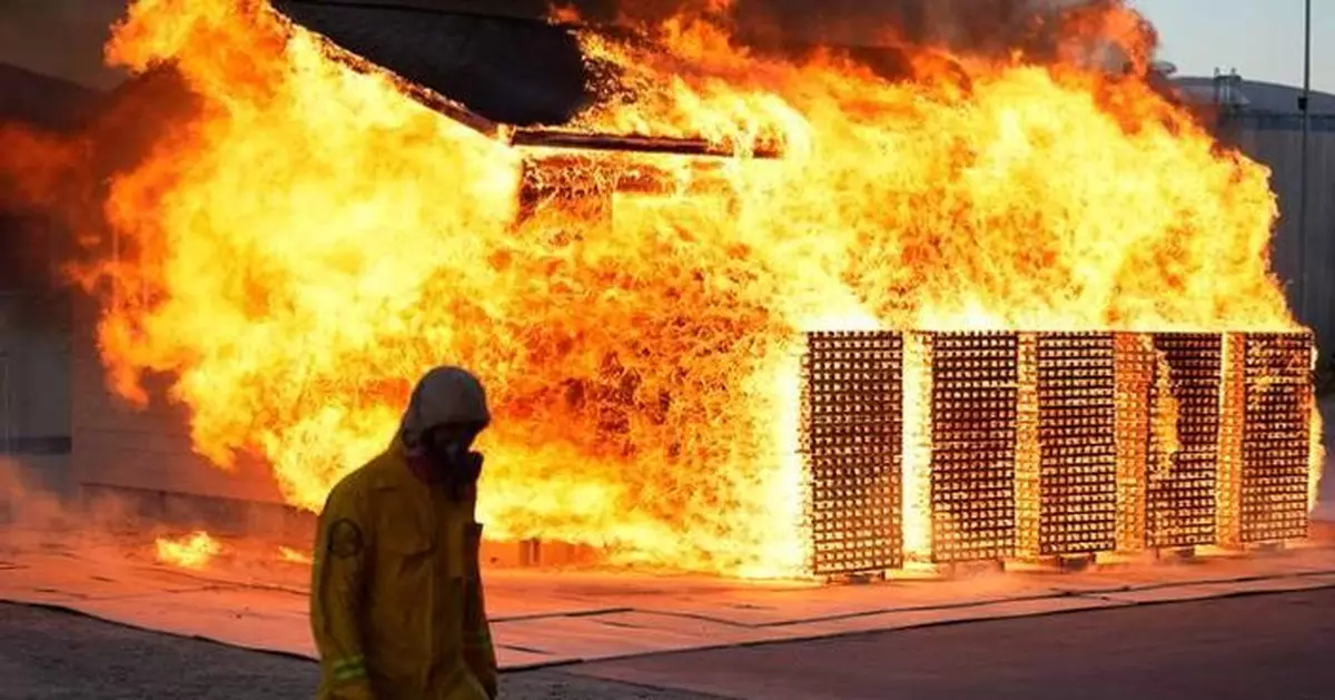 As the planet warms, scientists burn homes to figure out how to best protect them in wildfires