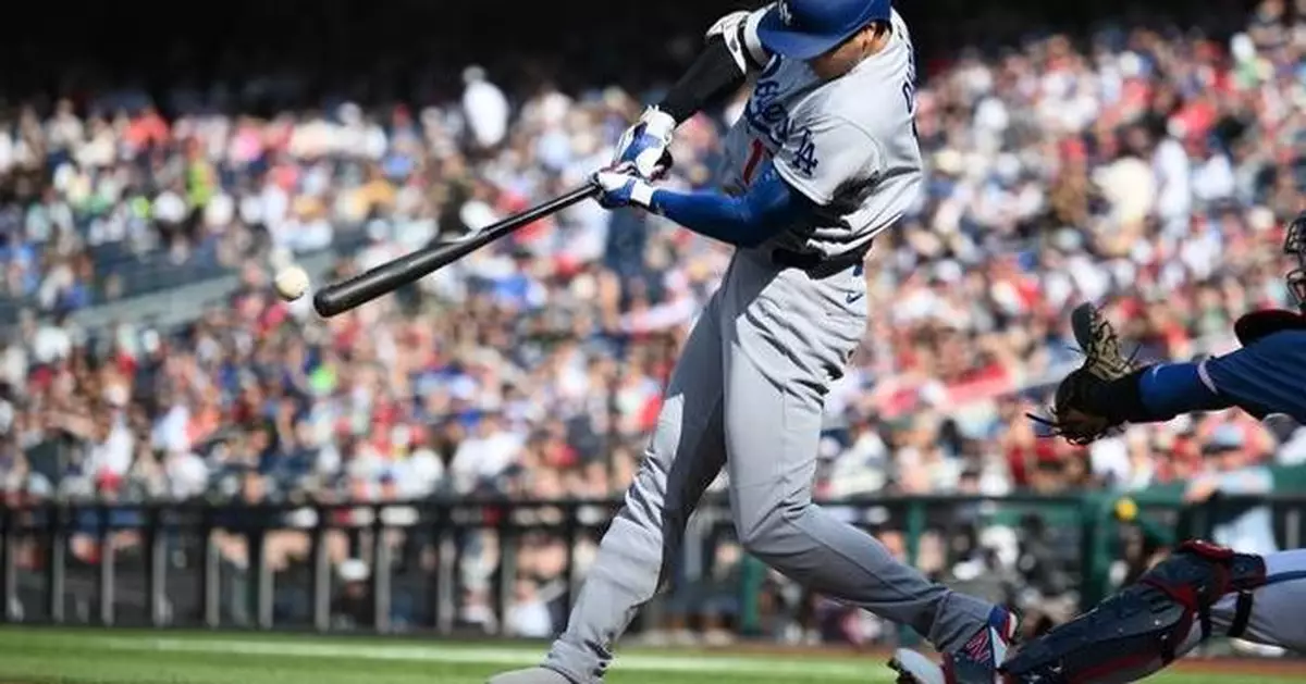 Freeman, Pages lead another offensive barrage by the Dodgers in a 10-5 win over Washington