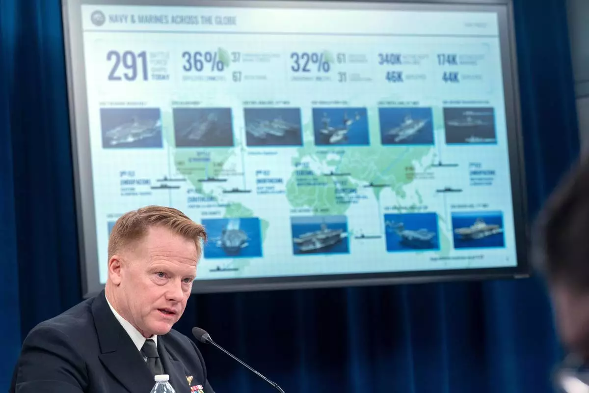 Deputy Assistant Secretary of the Navy for Budget/Director, Fiscal Management Division, Rear Adm. Ben Reynolds talks to reporters during a briefing on the Navy's FY27 budget at the Pentagon, Tuesday, April 21, 2026 in Washington. (AP Photo/Kevin Wolf)