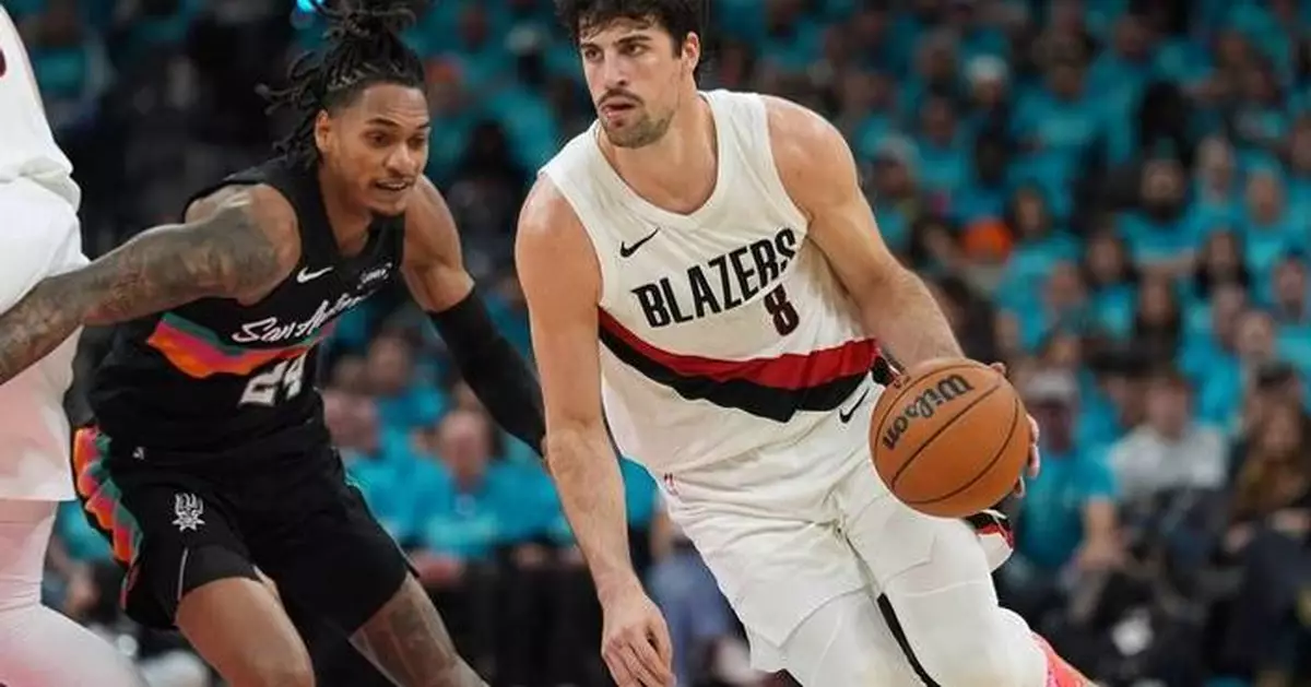 Wembanyama scores 35 points in playoff debut as Spurs roll past Trail Blazers 111-98