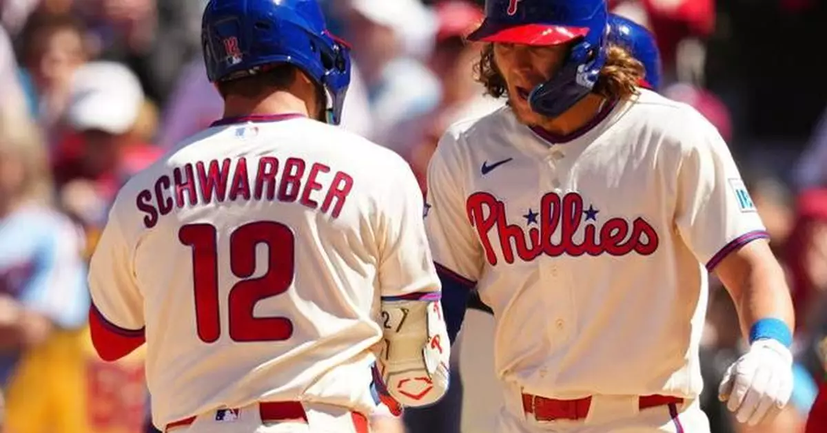 Schwarber, Harper homer to lead Phillies over Diamondbacks 4-3 to stop 3-game skid